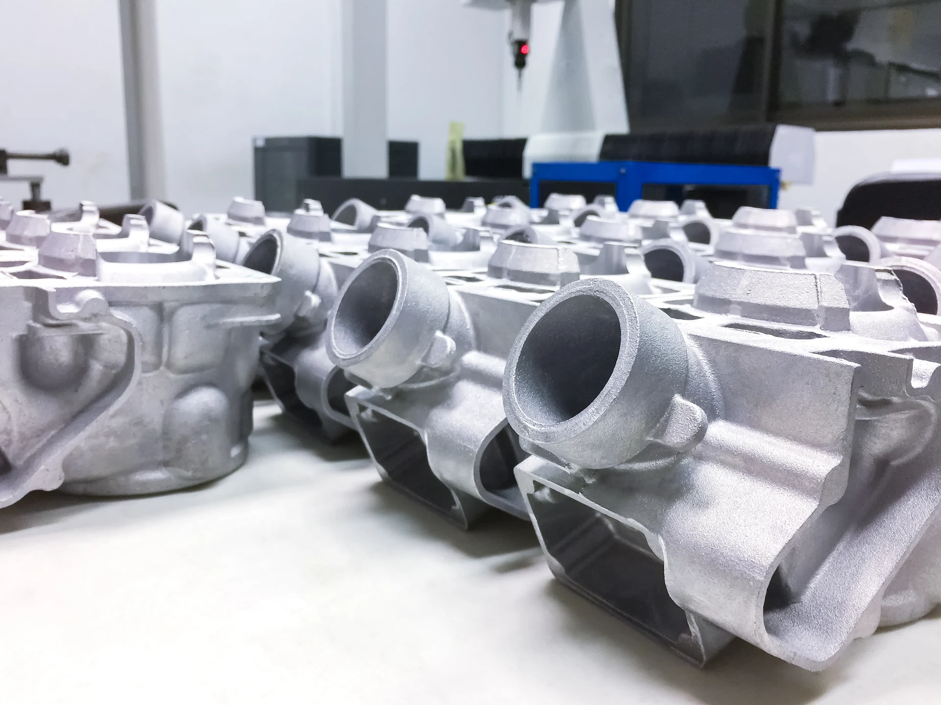 Die-cast aluminium automotive components in a manufacturing facility