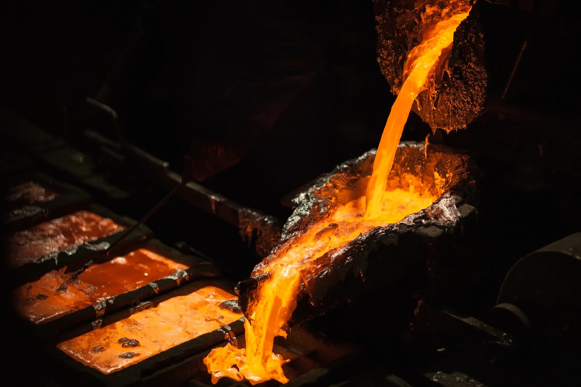 Molten metal being poured in a foundry